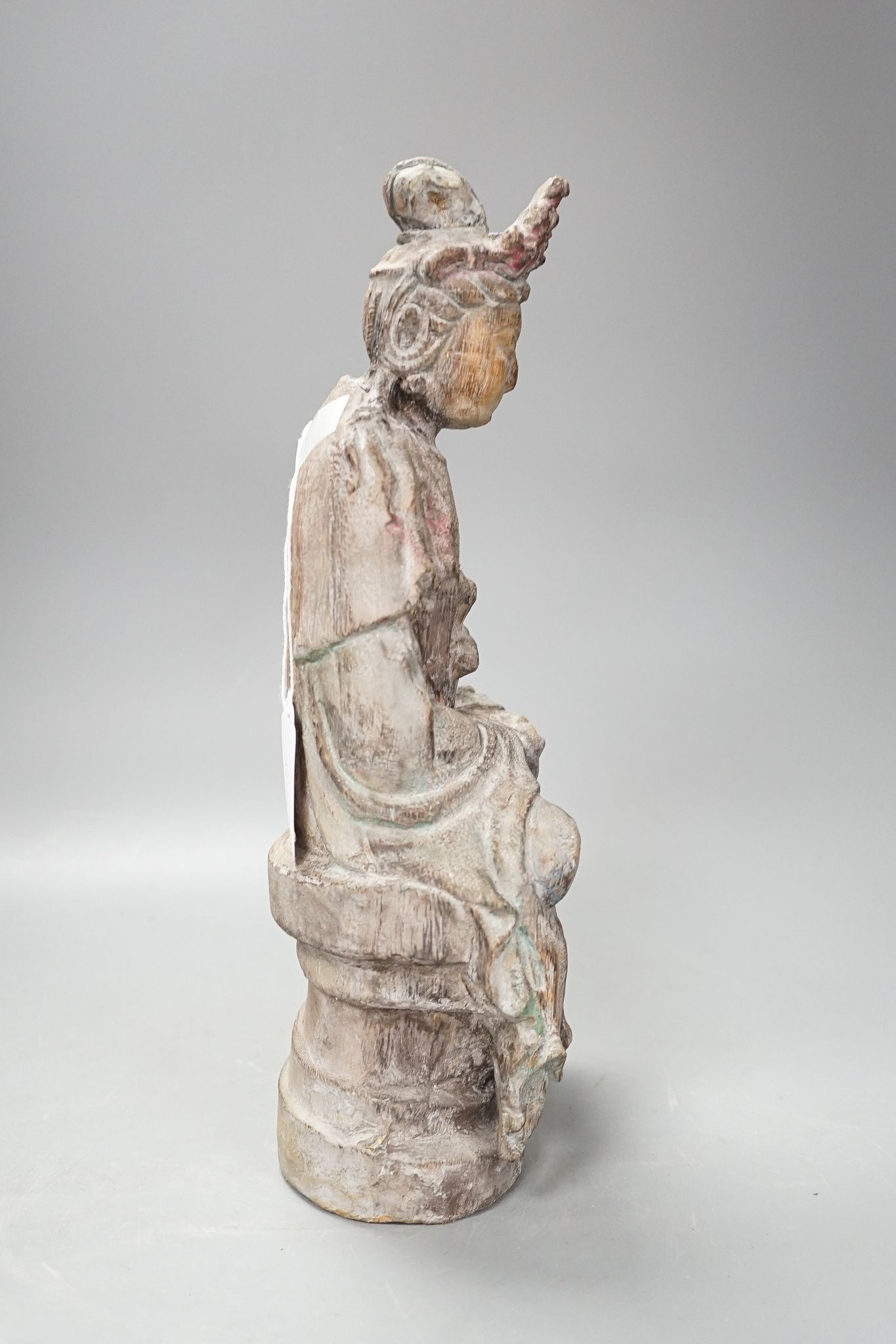 A Chinese carved wood figure of Guanyin, 35cm